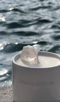 Load image into Gallery viewer, RAW ENERGY - RAW CRYSTAL QUARTZ INFUSED SCENTED TINY WHITE CANDLE