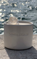 Load image into Gallery viewer, RAW ENERGY - RAW CRYSTAL QUARTZ INFUSED SCENTED TINY WHITE CANDLE