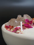 Load image into Gallery viewer, BALANCE - SMOKED QUARTZ CRYSTAL INFUSED AND DRIED ORGANIC ROSE PETALS SCENTED WHITE MIDDLE CANDLE
