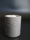 Load image into Gallery viewer, RAW ENERGY - RAW CRYSTAL QUARTZ CRYSTAL INFUSED SMALL GREY CANDLE
