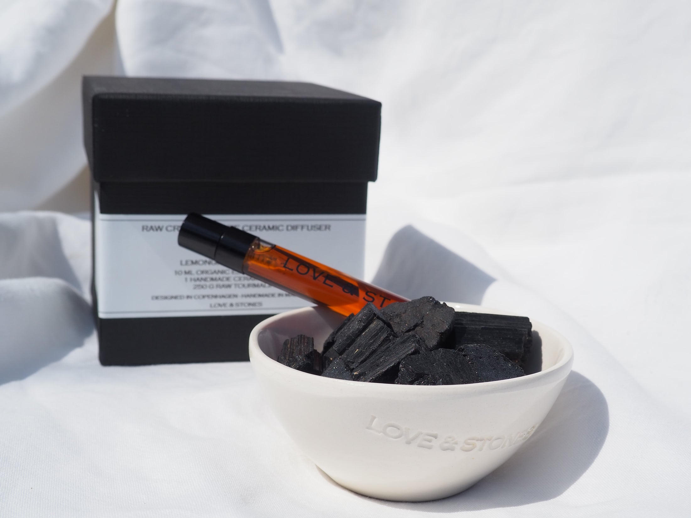 HEAL - RAW BLACK TOURMALINE  CRYSTAL SCENTED DIFFUSER IN OUR WHITE HANDMADE MINI BOWL